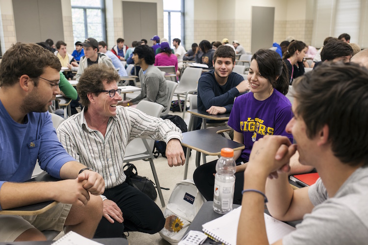 professor speaking with students